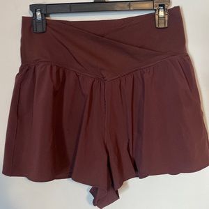 Aerie burgundy athletic flowy shorts with spandex shorts attached on the inside